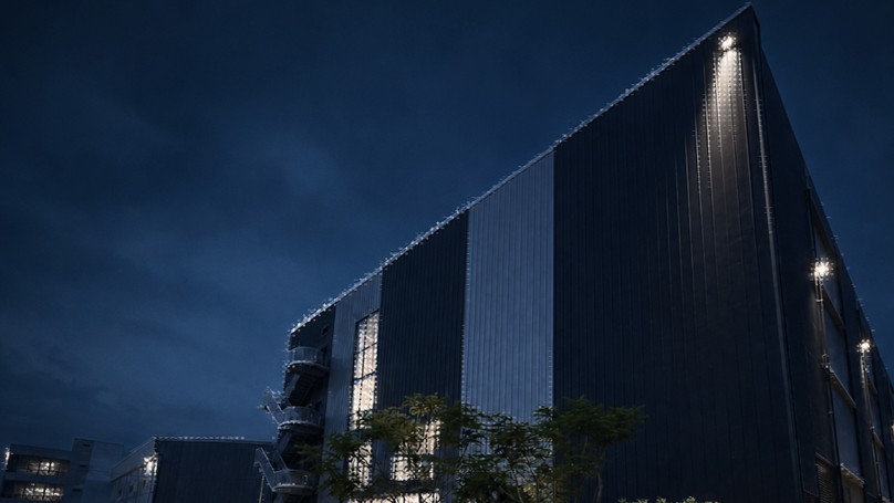 Night-time exterior render of a OneQode datacenter in Bangkok, Thailand